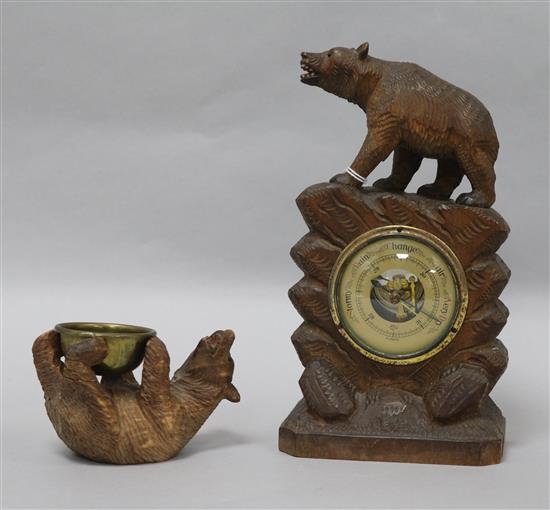A Black Forest barometer and another carving barometer height 23cm